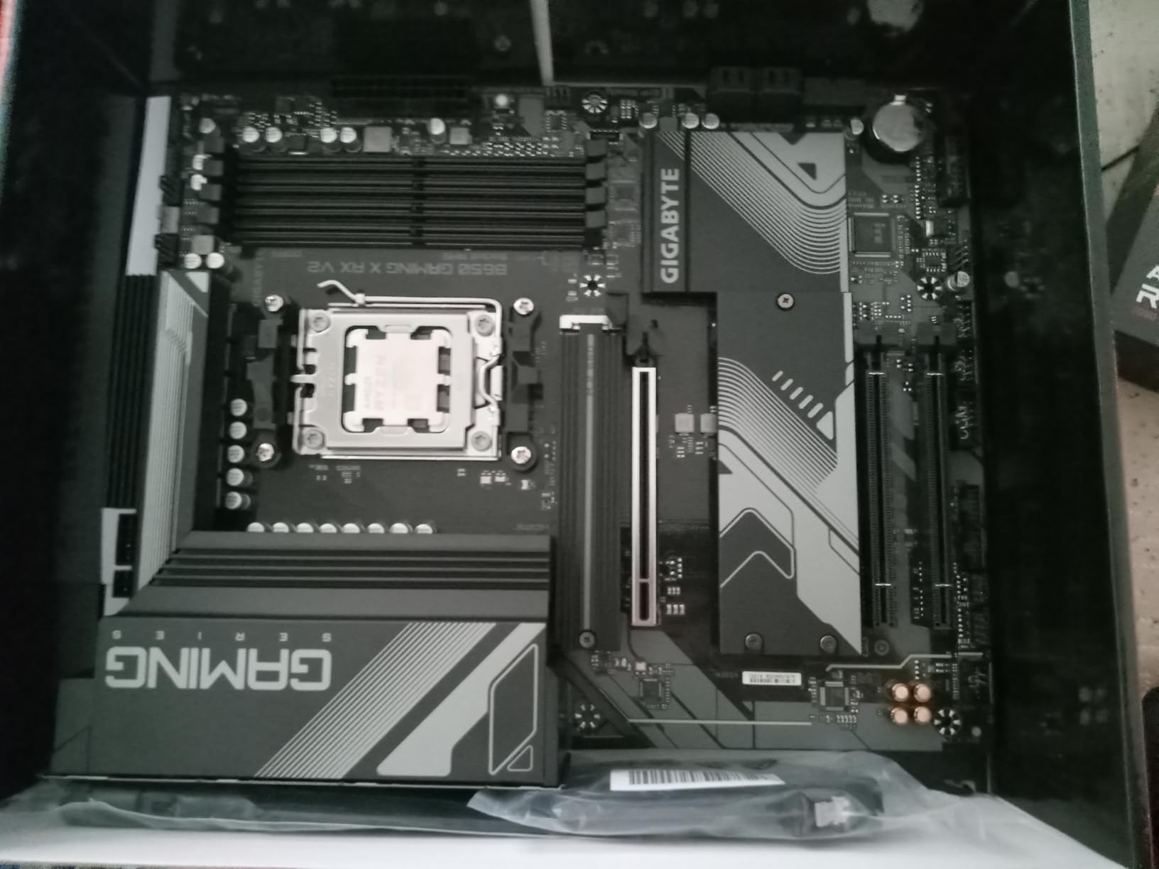 GIGABYTE B650 Gaming X AX AMD AM5 ATX Motherboard, Support Ryzen 9000/8000/7000, DDR5, 8+2+1 Power Phase, 3X M.2, PCIe 4.0, USB-C 3.2 Gen 2, WIFI6E, 2.5GbE, EZ-Latch, Q-Flash, RGB Fusion customer photo 1