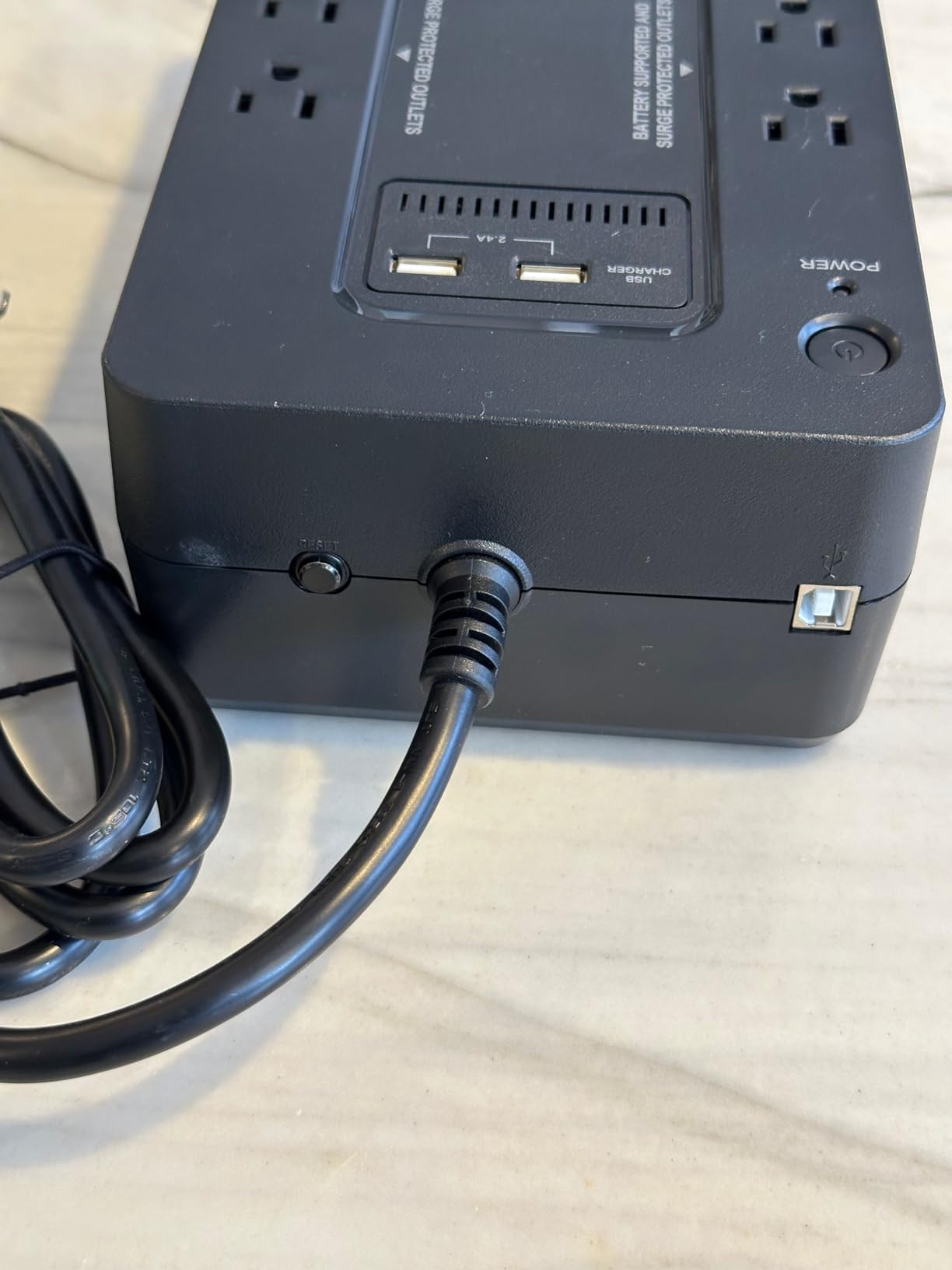 Staples TECH 650VA UPS Battery Backup, 8 Outlets, Surge Protection, Black | Standby power for computers, routers, and home office electronics during outages. customer photo 1