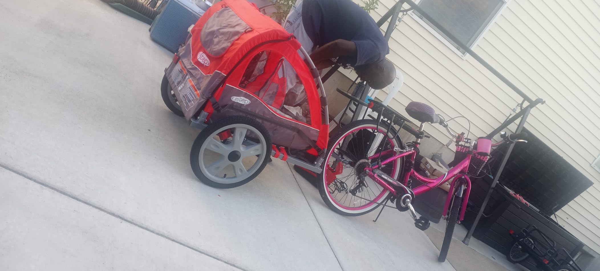 Instep Take 2 Double Seat Bike Child Trailer, Max Weight 80 lbs., 5-Point Harness, Folding Frame, Quick Release Wheels, Bug Screen & Weather Shield, Red customer photo 1