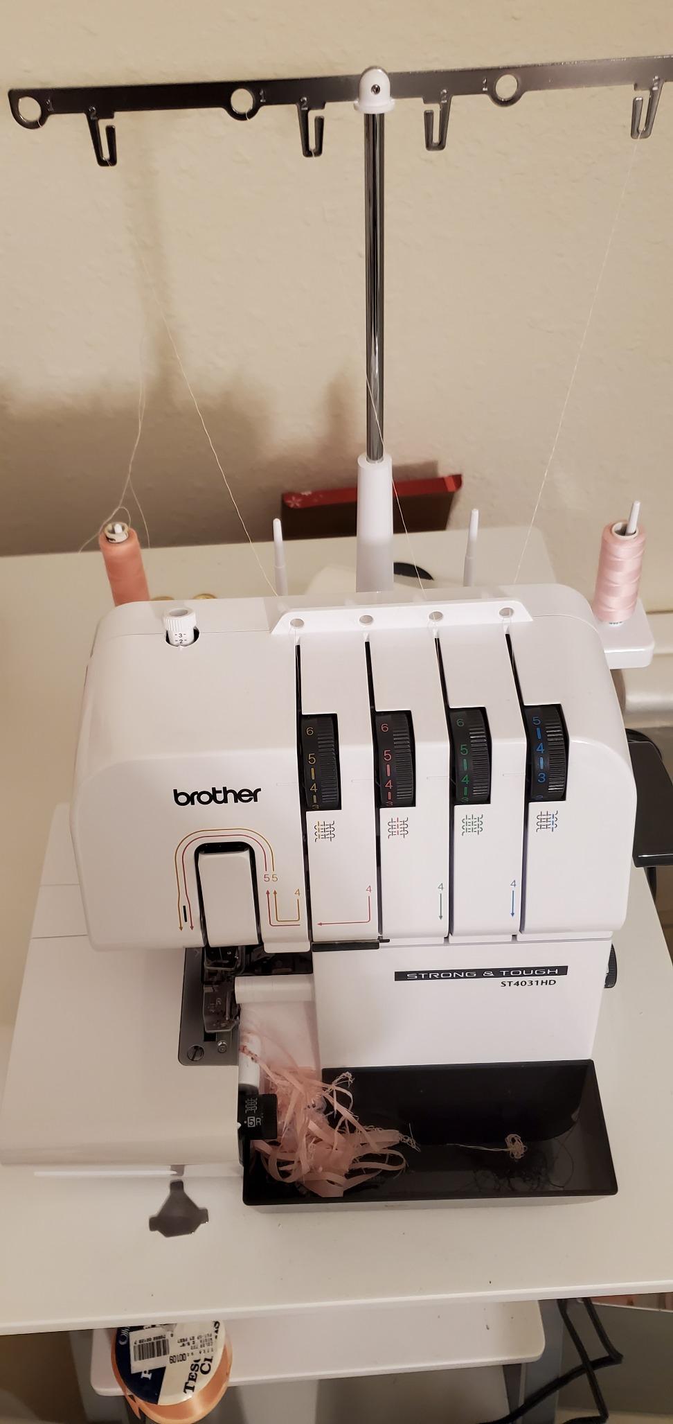 Brother ST4031HD Serger, Strong & Tough Serger, 1,300 Stitches Per Minute, Durable Metal Frame Overlock Machine, Large Extension Table, 3 Included Accessory Feet, 12.99 x 14.37 x 17.01 in., White customer photo 1