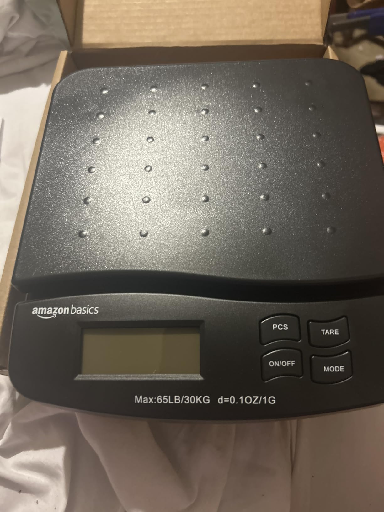 Amazon Basics Digital Postal Shipping Scale with Tare Function, AC Adapter, 65 lb Capacity, 0.1 oz Readability, LCD Display, Black customer photo 2