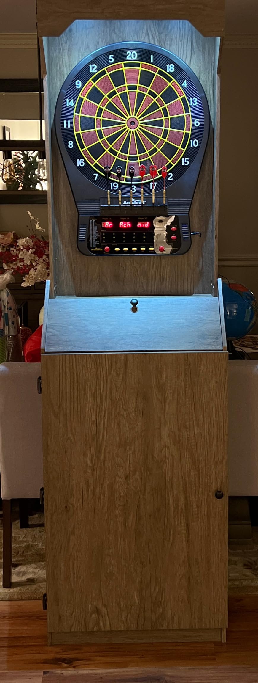 Arachnid Rustic Wood Cabinet: Freestanding LED Unit with E650 Electronic Board. Features 33 Games, 303 Variations, and 8-Player Scoring. Includes 6 Darts and Accessories for a Complete Setup. customer photo 1