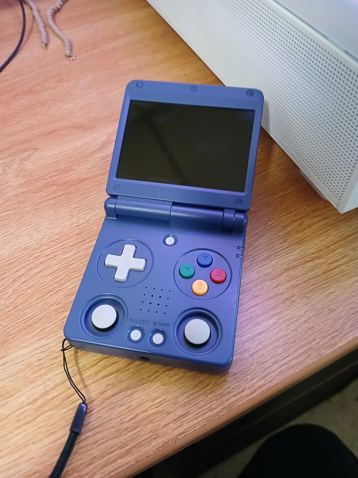Anbernic RG34XXSP Retro Handheld Game Console RG34XX SP Retro Gaming Console with 64G Preloaded 5000+ Games,3300 mAh Battey, Portable Pocket Arcade Support 30+ Simulators 5G WiFi Bluetooth HD Indigo customer photo 2