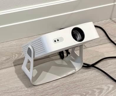 [Officially-Licensed App & Auto Focus]White Smart Mini Projector with WiFi and Bluetooth, XuanPad 4K Support Movie Projector, Portable Native 1080P Outdoor Projector with 360° Stand customer photo 2